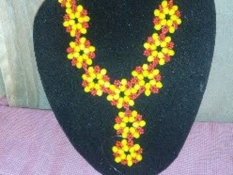 The tutorial on how to make this yellow and red necklace bead