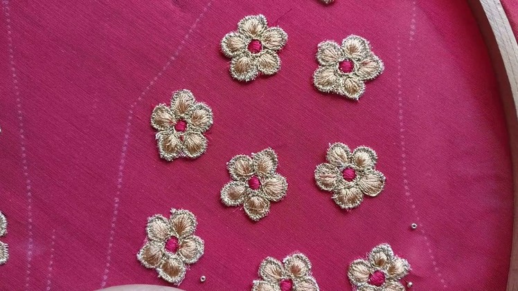 5 Petal Flower Aplic Embroidery being Embellished with small beads