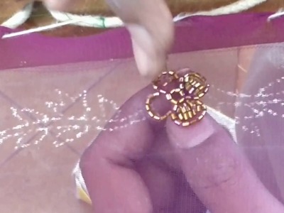 Making a flower using cylindrical beads embroidery