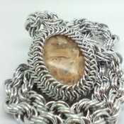 Yellow crazy agate cabochon on a spiral weave chainmaille/chainmail chain