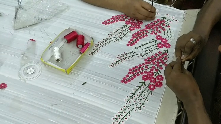 Floral saree being made with embroidery
