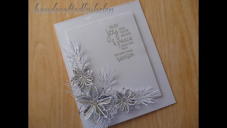 Silver and white poinsettia die card