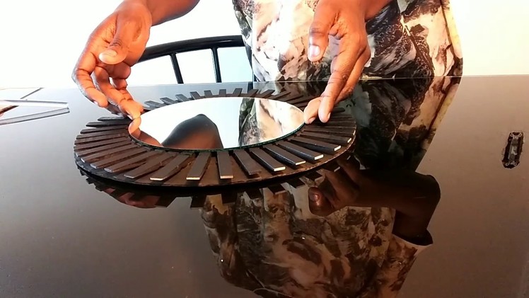 DIY. How to create an unique clothespins starburst mirror.