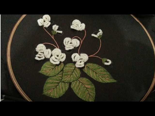 Hand embroidery beautiful jasmine flower with leaves