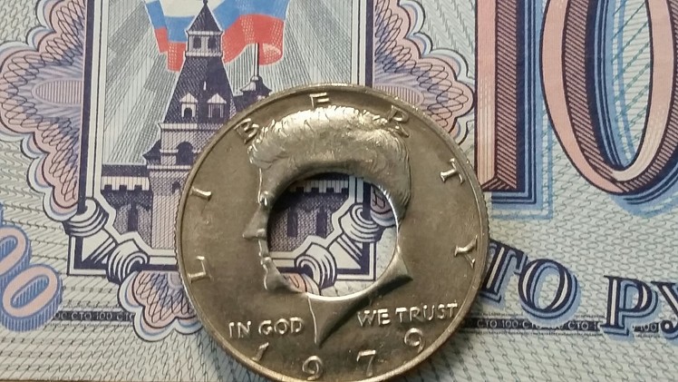 Inexpensive way to get a perfectly centered punch in your coin to make a coin ring