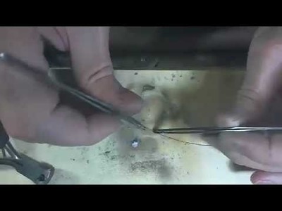 Soldering a chain.