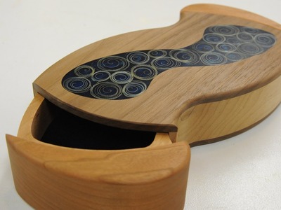 Spiral Inlay and Curved Drawers