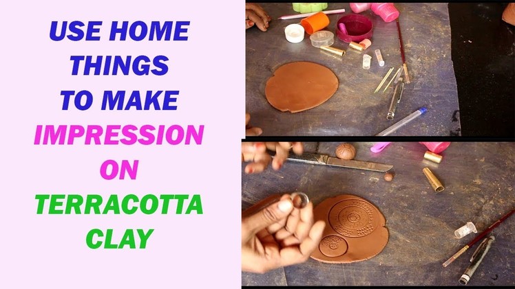Use home  thing to make impression  on terracotta clay. impression on clay