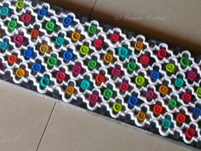 Beautiful multicolored lacy border rangoli design | Innovative rangoli designs by Poonam Borkar