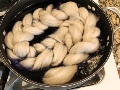 Breaking Wilton's Violet Food Coloring on Braided Roving