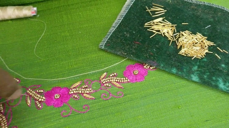 Floral design leaf highlighted with Zardosi embroidery