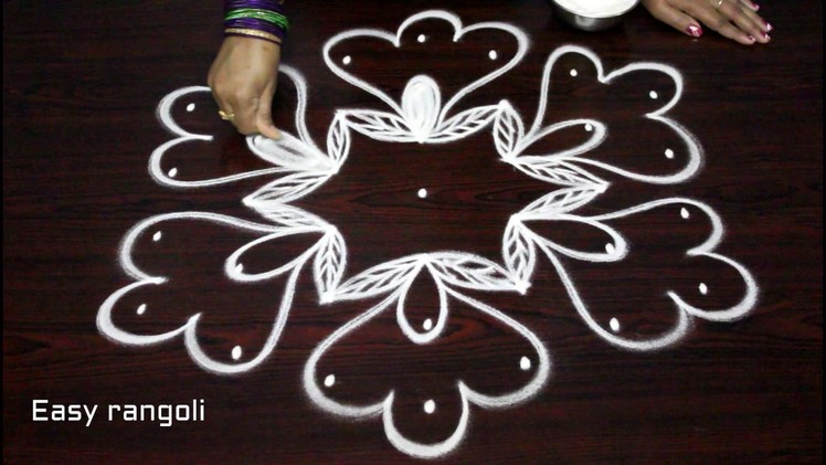 Muggulu designs with 7 dots - simple kolam designs - creative rangoli designs with dots