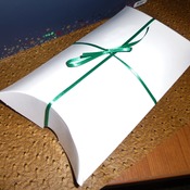 Quality leather case wrapped in the pillow gift box