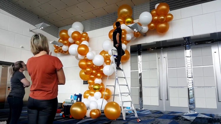 Organic white and gold balloon installation
