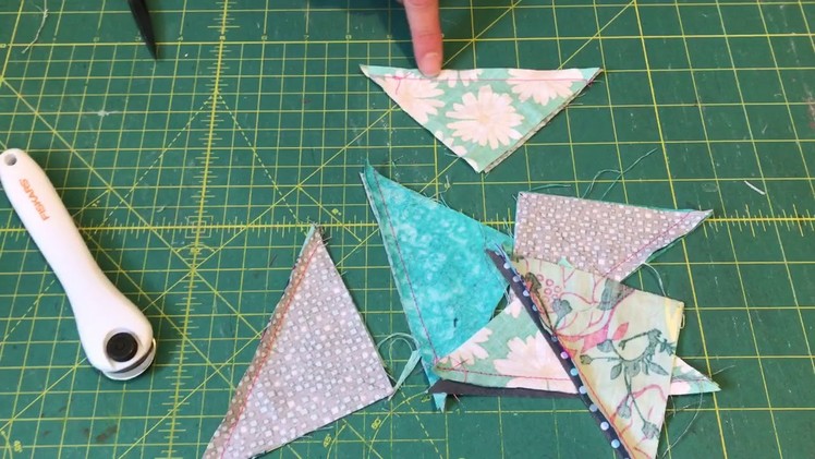 Accordion sewn scrappy half square triangles Part 3 - cutting apart and trimming
