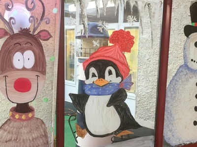 Christmas window painting at LauraLynn