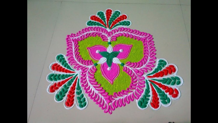 Colourfull flower type Rangoli design.