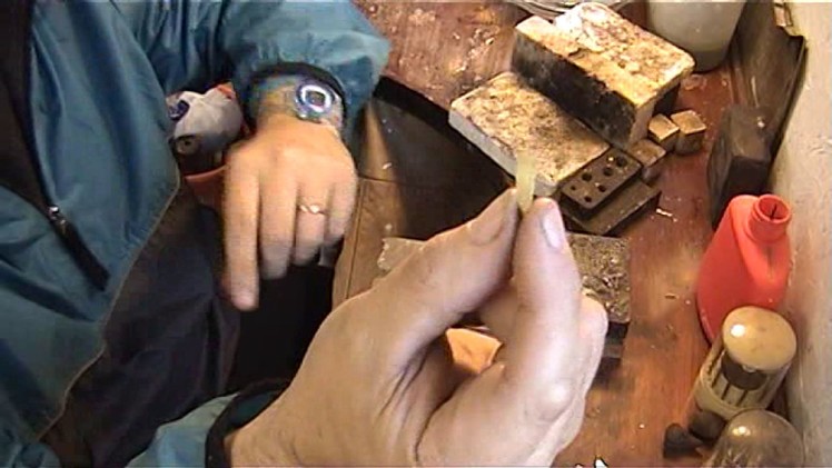 Goldsmith at work repairing jewellery video 3