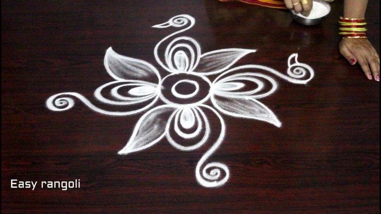 How to draw beautiful indian peacock rangoli art designs || kolam designs || muggulu designs