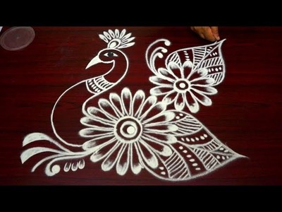 Latest simple peacock kolam designs with out dots - easy rangoli designs - muggulu rangoli designs