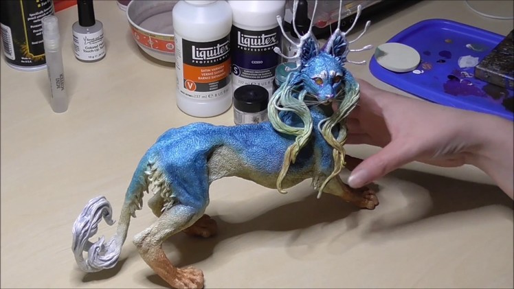 Painting a sculpture: Using pastels and mica powder to build up color