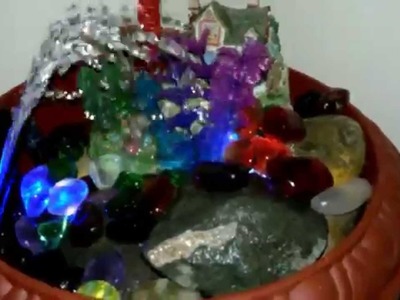 Tabletop water fountain with colorful stones and leds