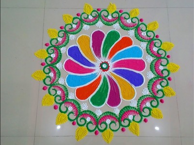 Big and beautiful multicolour rangoli design.