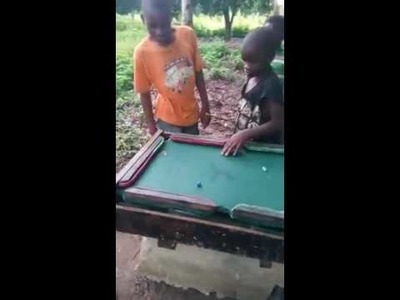 First African kids home made pool table cost zero dollars