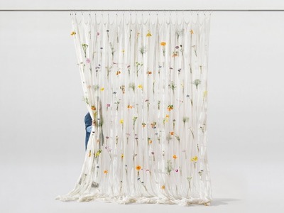 Fresh blooms decorate Draped Flowers Curtain woven from paper