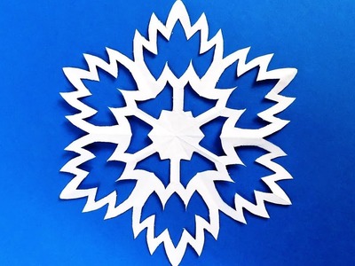 Paper snowflake tutorial. learn how to make snowflakes in 5 minutes