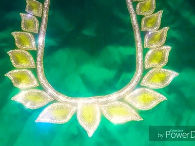 Beautiful leafs  nek  design aari work stone chain tred simple hand work Back nek Blouse design. . 