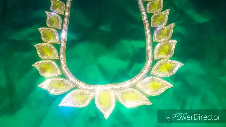 Beautiful leafs  nek  design aari work stone chain tred simple hand work Back nek Blouse design. . 