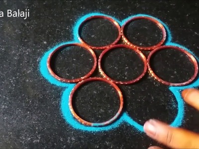 Diwali rangoli designs  with colours | Easy peacock rangoli | Tools - paper cups, ice cream sticks