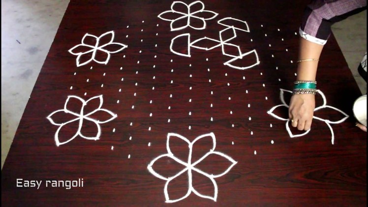 Flower kolam designs with 15x8 interlaced dots || chukkala muggulu || easy rangoli designs with dots