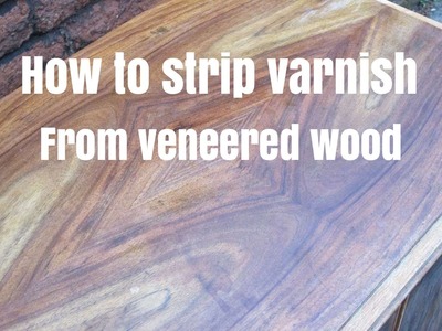 Stripping varnish from veneered wood furniture