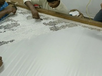 Cutwork on a white bridal saree