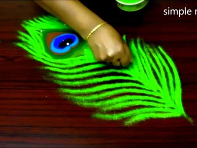 Latest peacock feather rangoli design  || Innovative rangoli designs || kolam with 3x2 dots