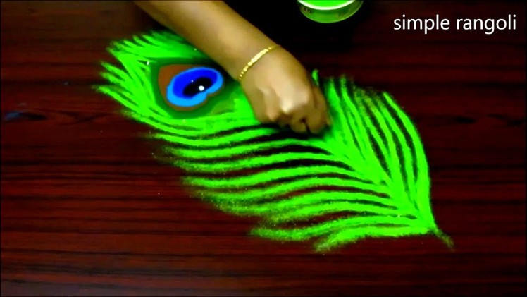 Latest peacock feather rangoli design  || Innovative rangoli designs || kolam with 3x2 dots