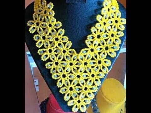 The tutorial on how to make this beautiful yellow and silver necklace bead.