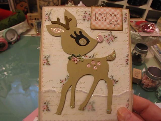 A tiny ribbon christmas tree gift and Christmas cards