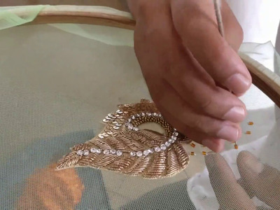 Boota work on a net fabric with Zardosi