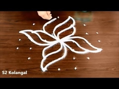 Latest and easy rangoli for diwali || diwali kolam with 7 dots || simple chukkala muggulu designs
