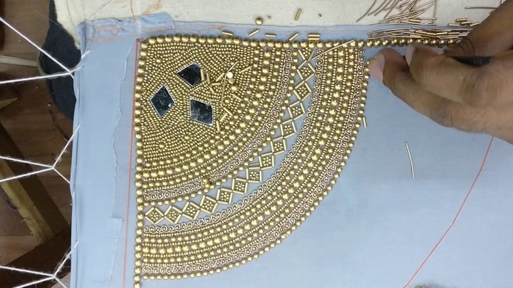 Latest saree design - Thick beads and mirror work embroidery