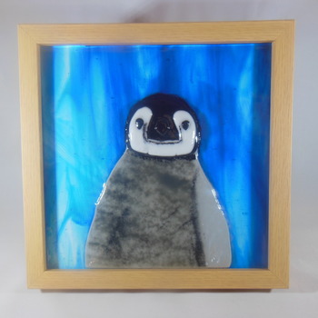 penguin made with fused glass,wood frame, goes by the name of 'RUBY' Handmade