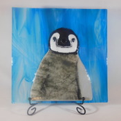 penguin made with fused glass,wood frame, goes by the name of 'RUBY' Handmade