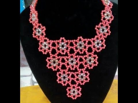 The tutorial on how to make this beautiful silver and red necklace bead