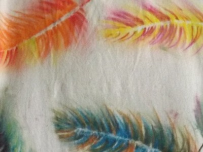 Using watercolour Derwent Inktense Blocks and Pencils to paint feathers on fabric. Fun for kids too!