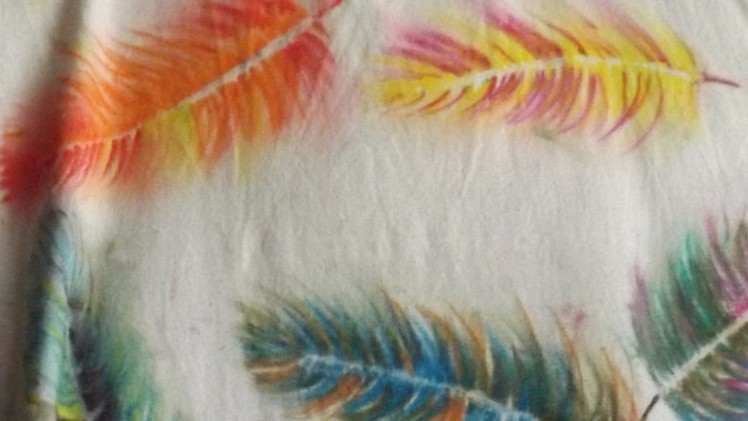 Using watercolour Derwent Inktense Blocks and Pencils to paint feathers on fabric. Fun for kids too!
