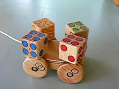Handmade wooden pull-along toy from the Fairy Ring
