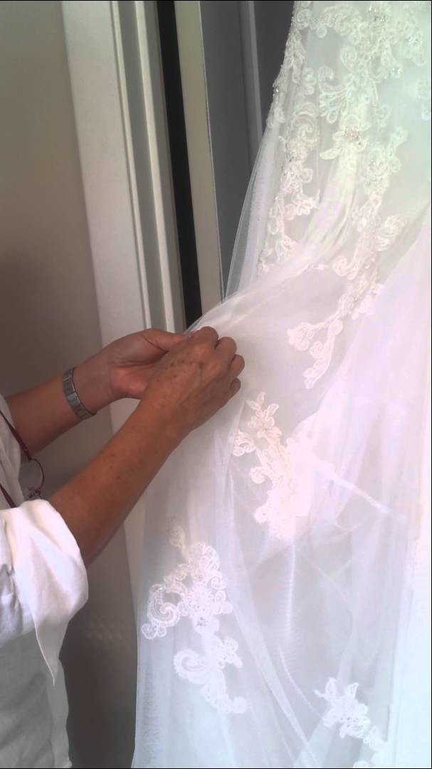How an over or under bustle works on a bridal ballgown